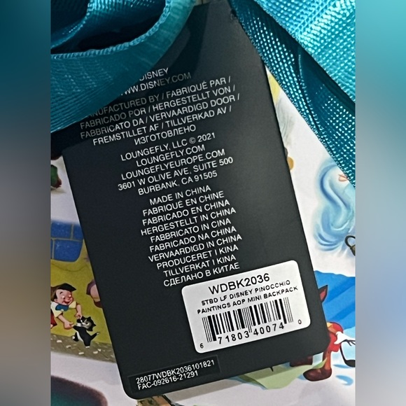 NWT-Loungefly/Disney’s Pinocchio painting AOP mini backpack - Picture 11 of 11